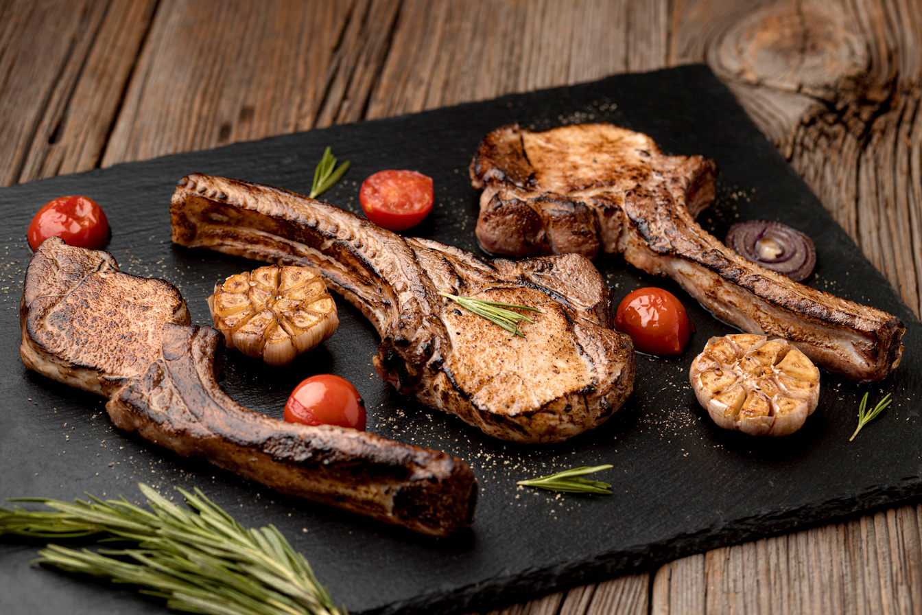 wooden-board-with-tasty-cooked-meat